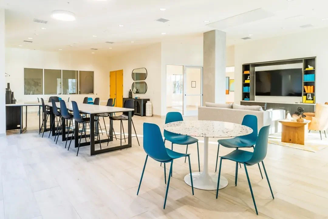 Common room with blue chairs