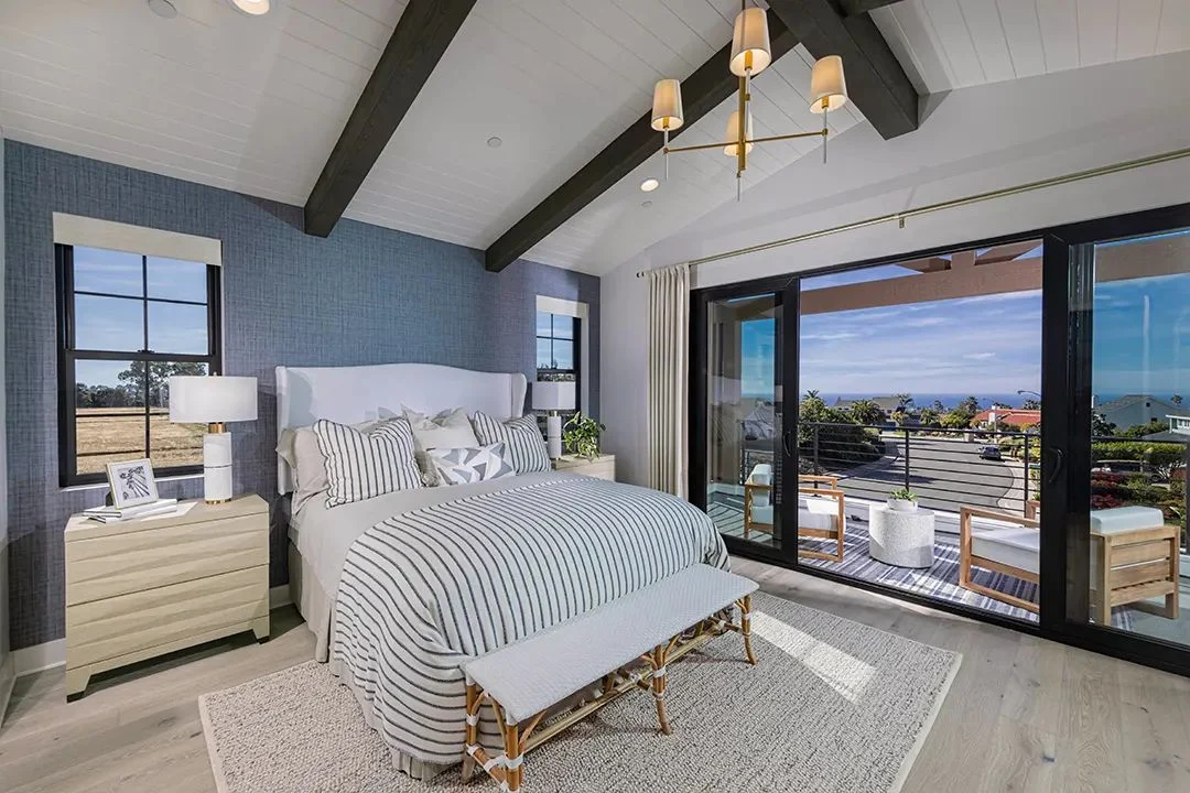 Fox Point Farms Cottage Plan model home primary suite opening to a deck