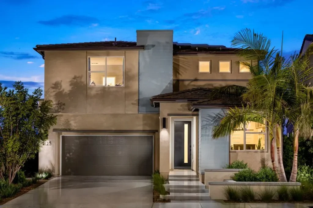 Lucca at Cota Vera Plan 1 model home exterior at dusk