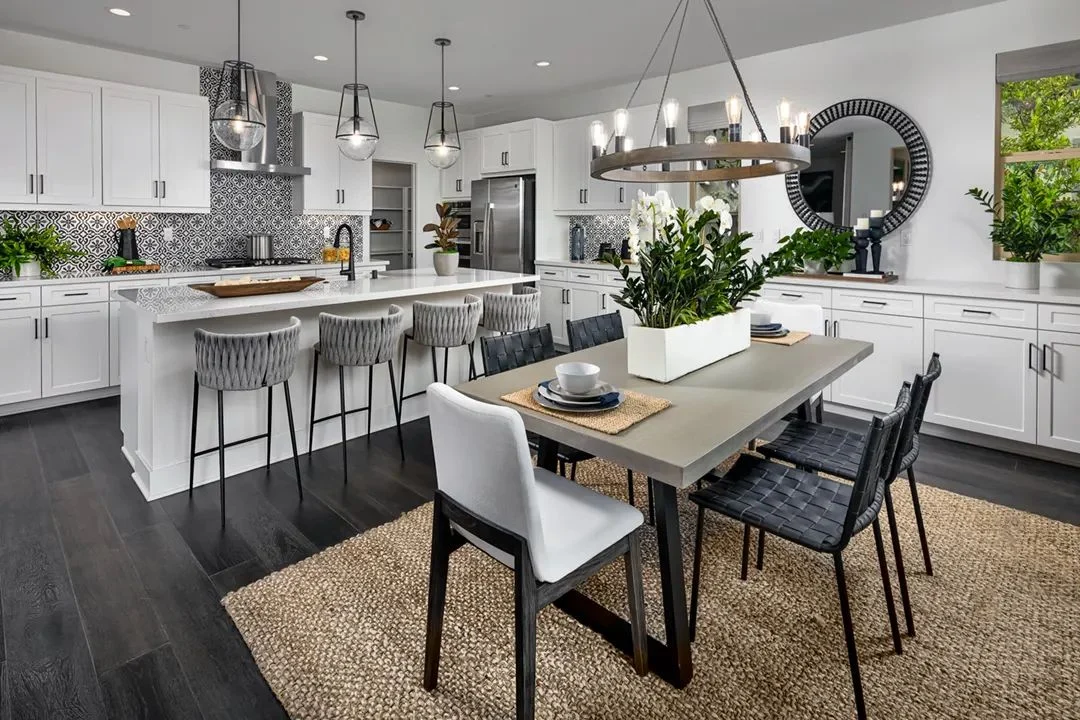 Lucca at Cota Vera Plan 2 model home kitchen and dining area