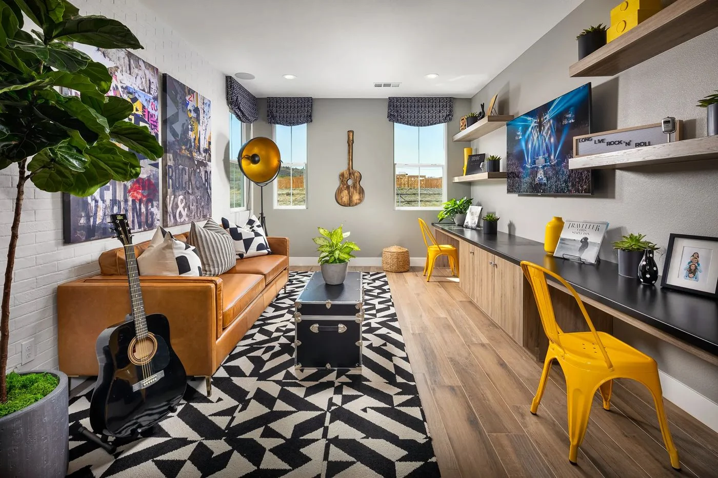 Lucca at Cota Vera Plan 3 model home teen lounge